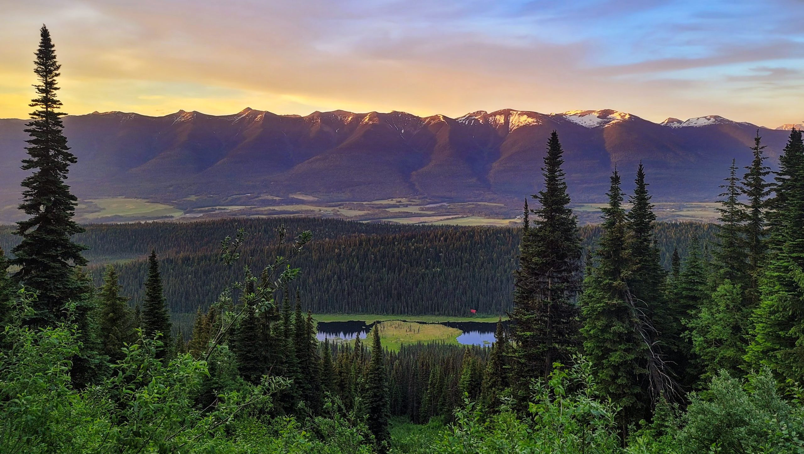 Sunset over the mountain range in McBride